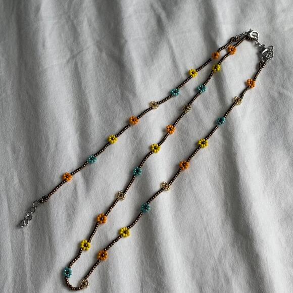 Other Jewelry - Yellow and blue flower beaded